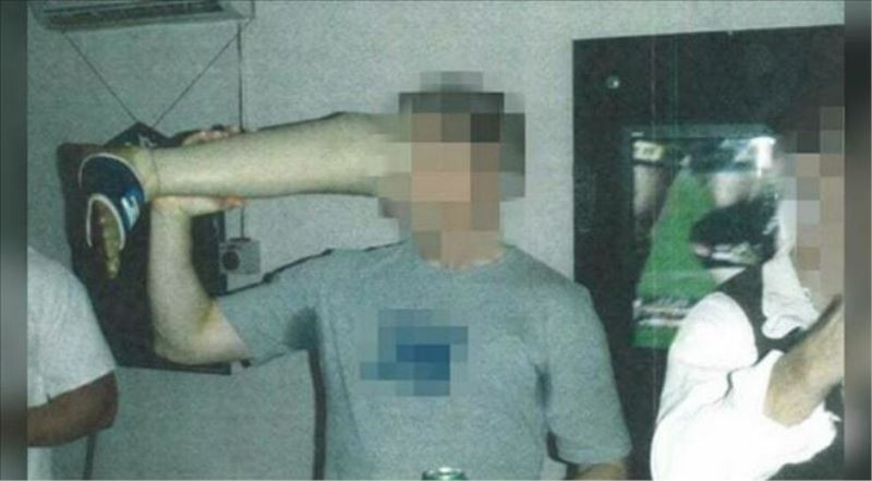 Afganistan´da savaş suçu raporunun şokundaki Avustralya Taliban´ın protez bacağıyla bira içen asker fotolarıyla yüzleşti